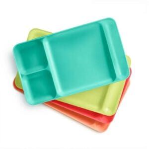 Stack of colorful divided lunch trays